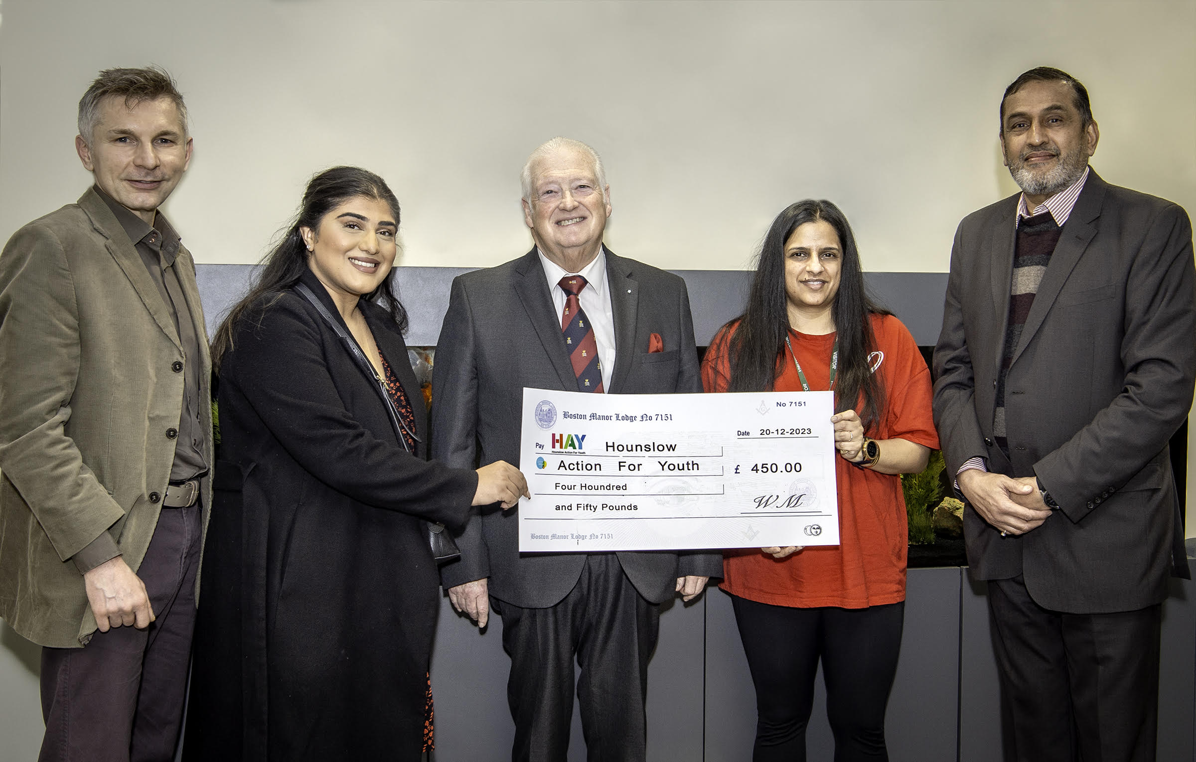 From L to R- W Bro Artur Lopata PM Shani Sidhu - Youth and Community Support Officer, Bijal Karavadra - Deputy Director of HAY, W Bro Peter Gledhill PGStB, PPrJGW, W Bro Abdulhusein Rehmanji Boston Manor Lodge Charity Steward. 
