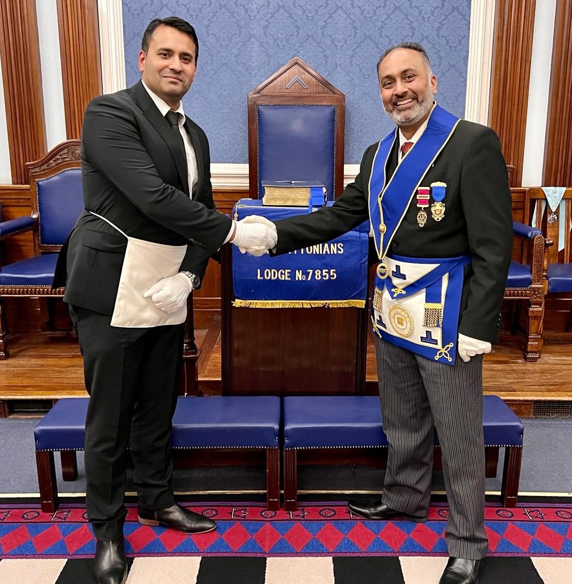 W. Bro Rupesh Valji with two of his candidates.