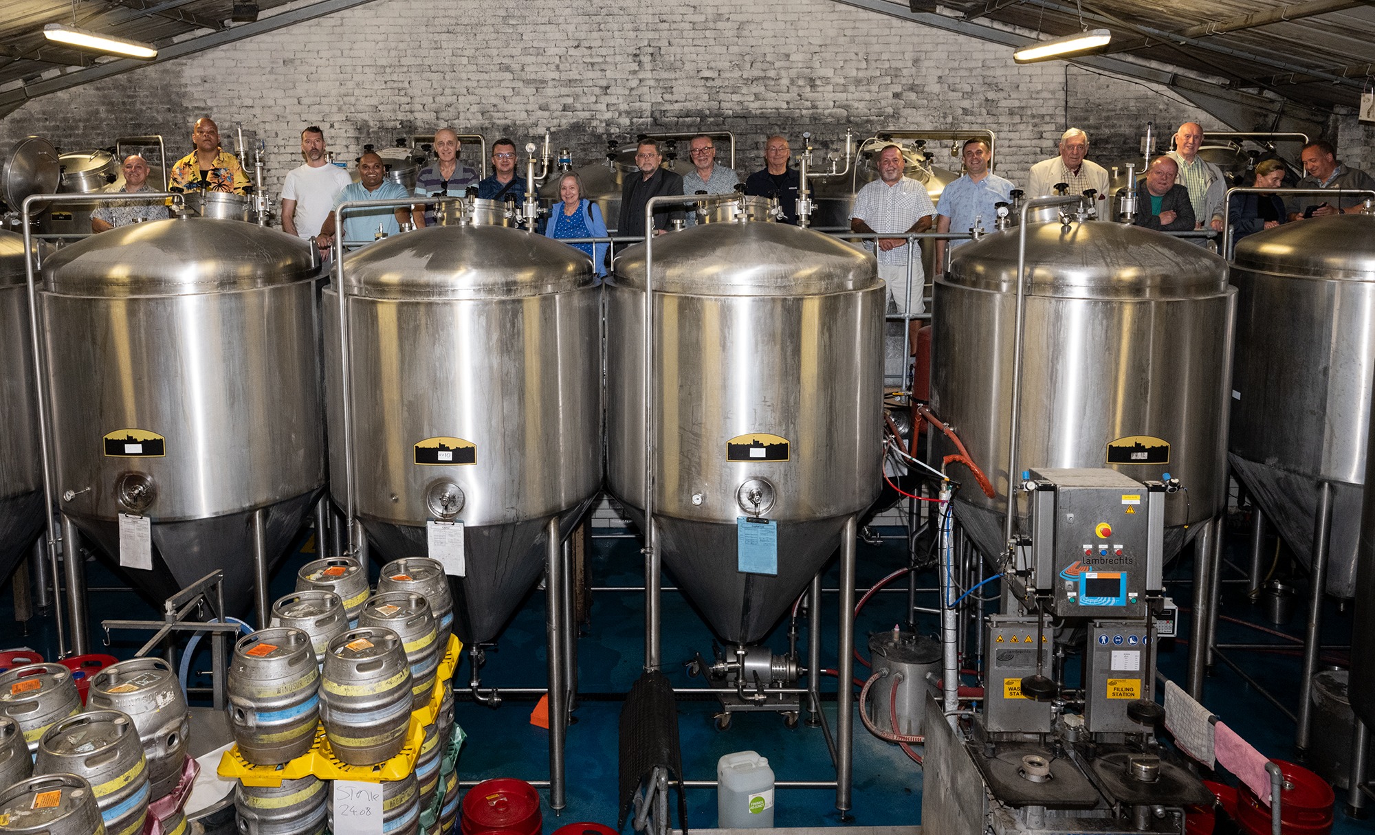 Group Photo on Top off the Brewing VATs Small