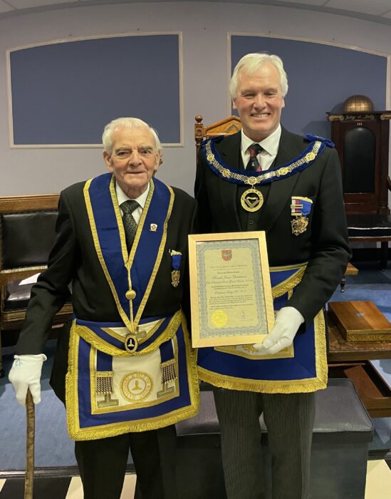 IMG_0251 W. Bro Ron Chesterman PPrSGW receiving his 70 years certificate of service from the APGM W.Bro Bob Rough PSGD at Parthenon Lodge No7310 meeting in April 2024