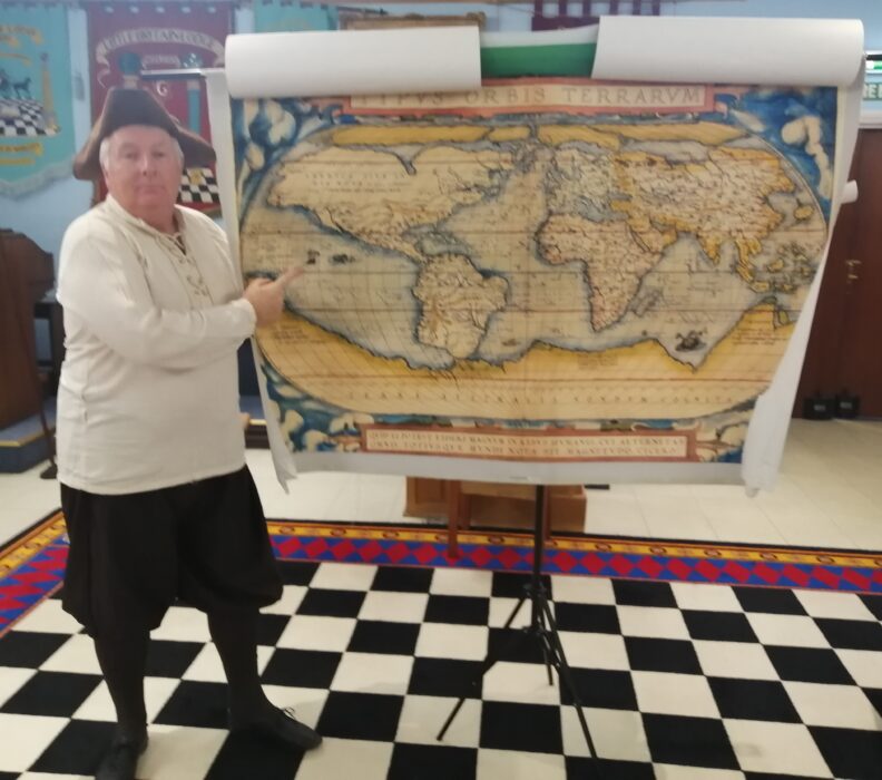 W. Bro Darryl Boot PPrGSuptWks pointing out the journey of Drake's ship.