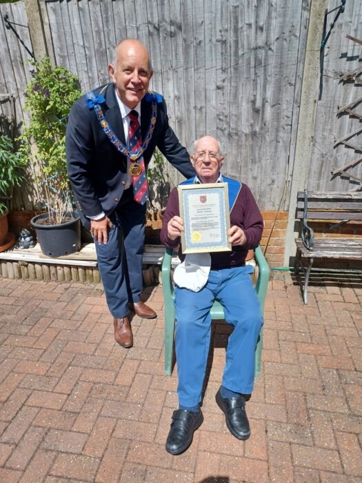 W. Bro Paul Sully APGM PAGSwdB presenting a 60-year Certificate to W. Bro Jim Salmon PPrJGW.