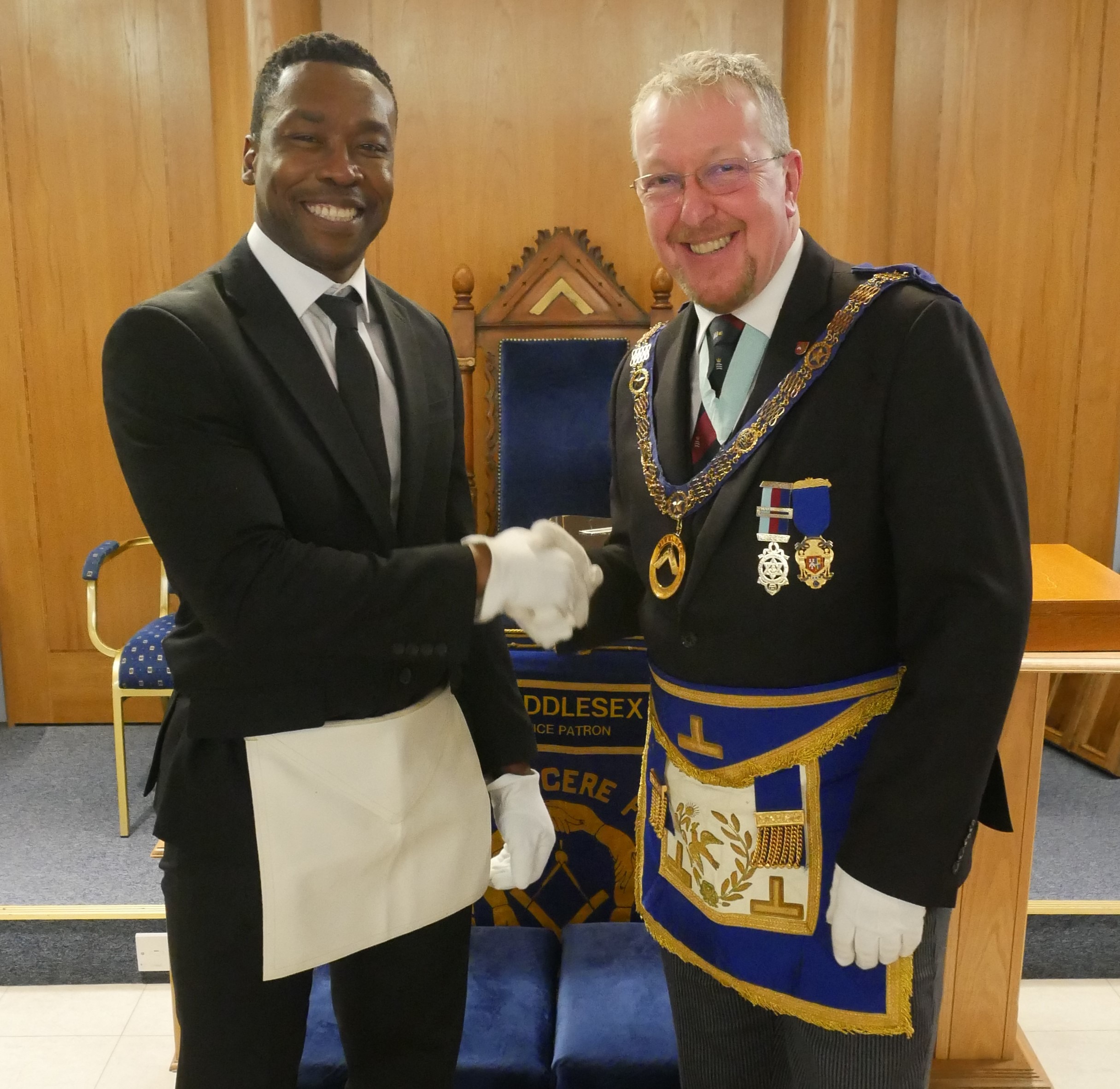 W. Bro Jim Mitchell Deputy Provincial Grand Master and Initiate Bro Serge Kpossou.