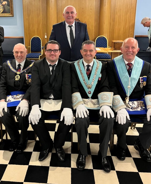 Left to Right: W. Bro John Leggett PSGD APGM (official Visit), Bro Dave Gingell Jnr (Initiate), Bro Dave Gingell Snr (at Back), W. Bro Michael Wilson WM  and W. Bro Paul Sully PAGSwdB APGM (Ickenham St Giles Member).