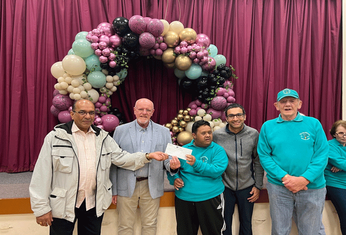 Photo Left to Right W Bro Ashok Shah, W Bro Brian Bailie, Syed (one of the club members) W Bro Kavit Nathwani, and Geoff Havard M.B.E.