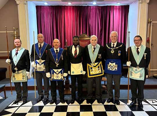 L-R: Bro Austin Whitehead, SD; W Bro David Smith, Provincial Deputy Grand Director of Ceremonies; W Bro Andy Rose, WM, Bro Edem Fiakponu; W Bro Peter Lovell MBE PPrGReg, the Secretary of the Lodge; W Bro Robert Rough, PSGD, APGM and Bro Jeremy Rosen, JD.