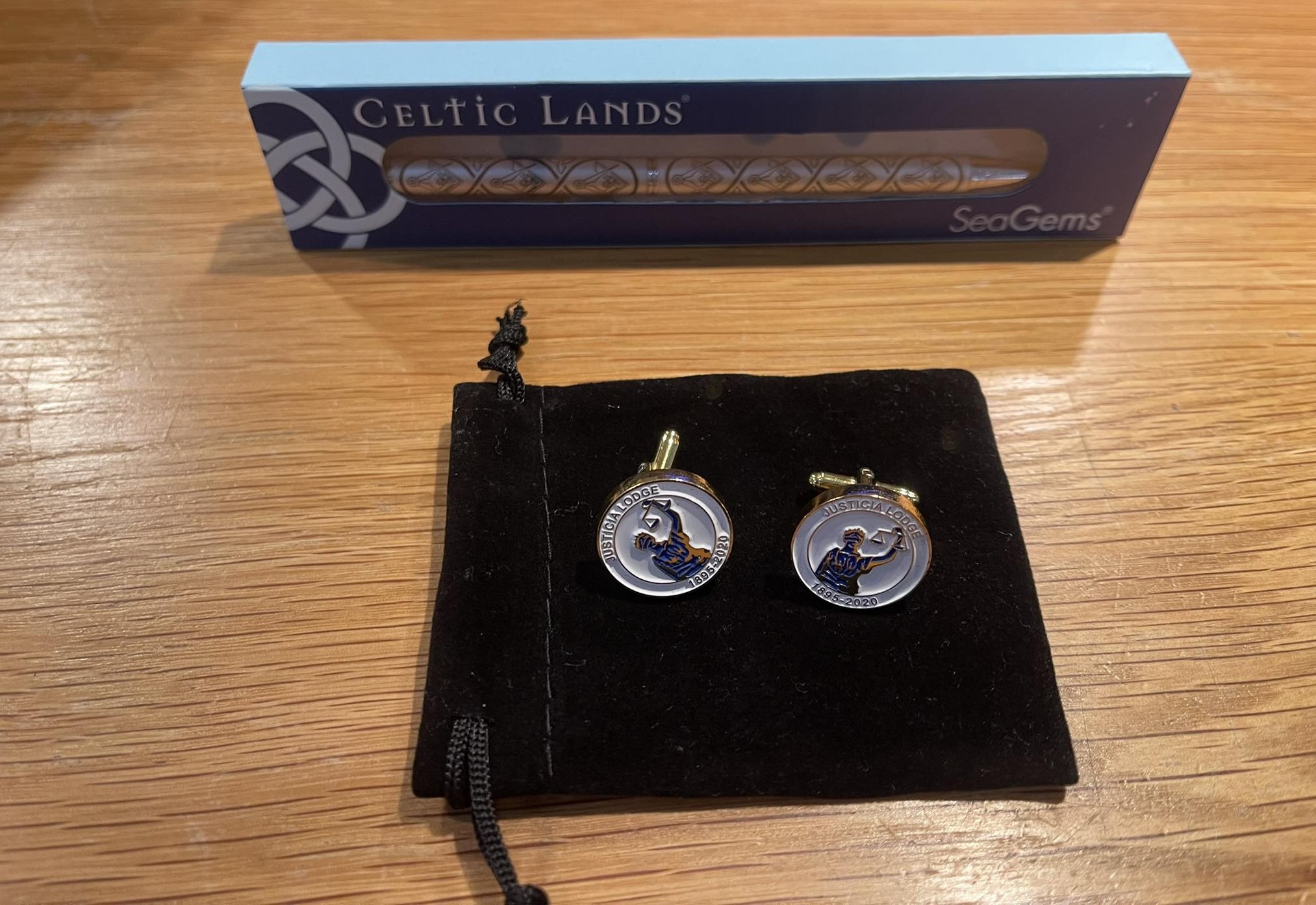 Justicia Lodge cufflinks presented to the visitors.