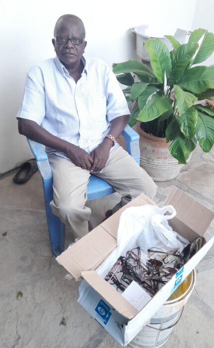 Another happy client with a box of optical goodies